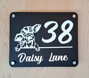 Peeking cow address plaque