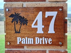 wooden address sign